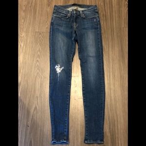 Mid rise distressed jeans. Size 26